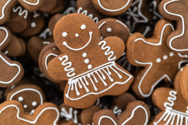Gingerbread cookies decorated with white royal icing.