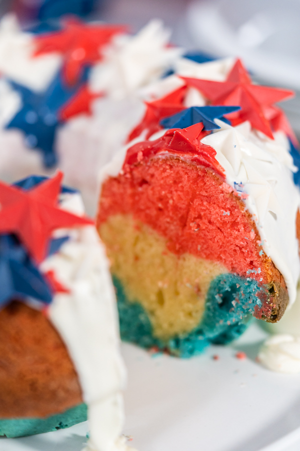 Sliced Bundt cake showing colorful layers