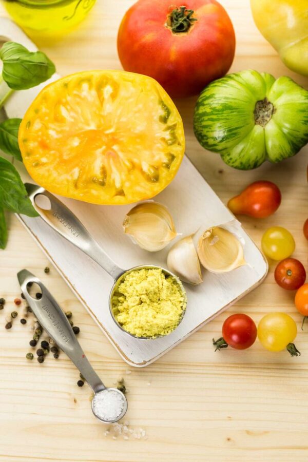 Ingredients to make roasted tomato soup with organic heirloom tomatoes.