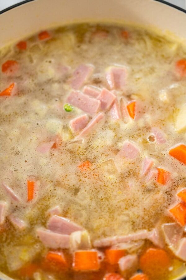 Cooking split pea soup in enameled cast iron dutch oven.