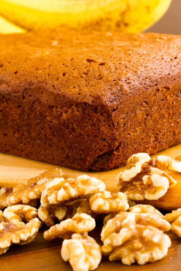Freshly baked classic banana bread with walnuts and bananas.