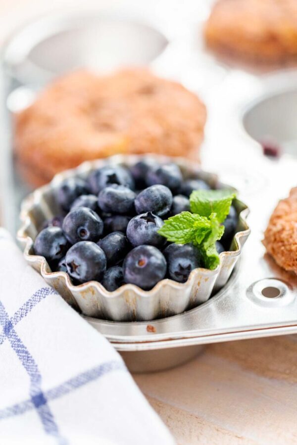 Homemade blueberry muffins made with organic ingredients.